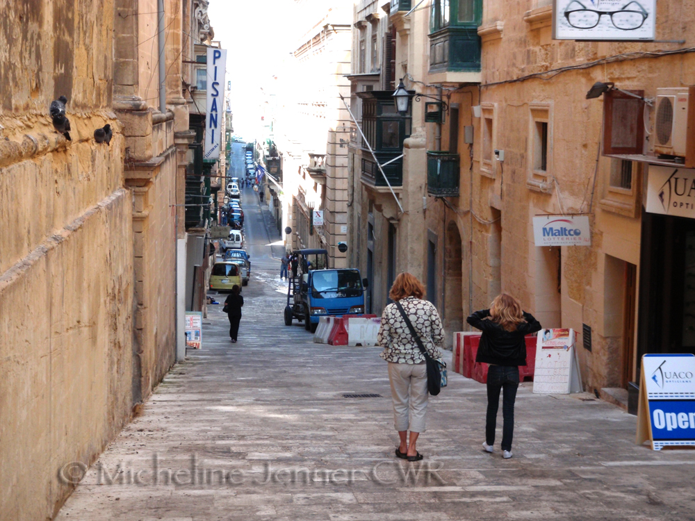 Tas and Jenny wandering the cobblestone streets of Valletta, Malta.