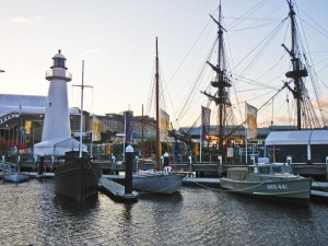 Iconic lighthouse and the distinctive masts of 'Endeavour' seen at the Australian National Maritime Museum. Photo credit M.Jenner