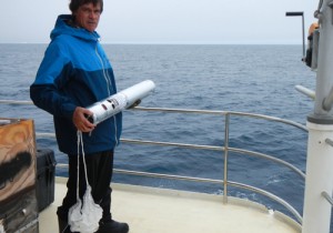 Monitoring the sounds of the sea using acoustics, Rob deploys a sonobuoy. Photo credit M. Jenner