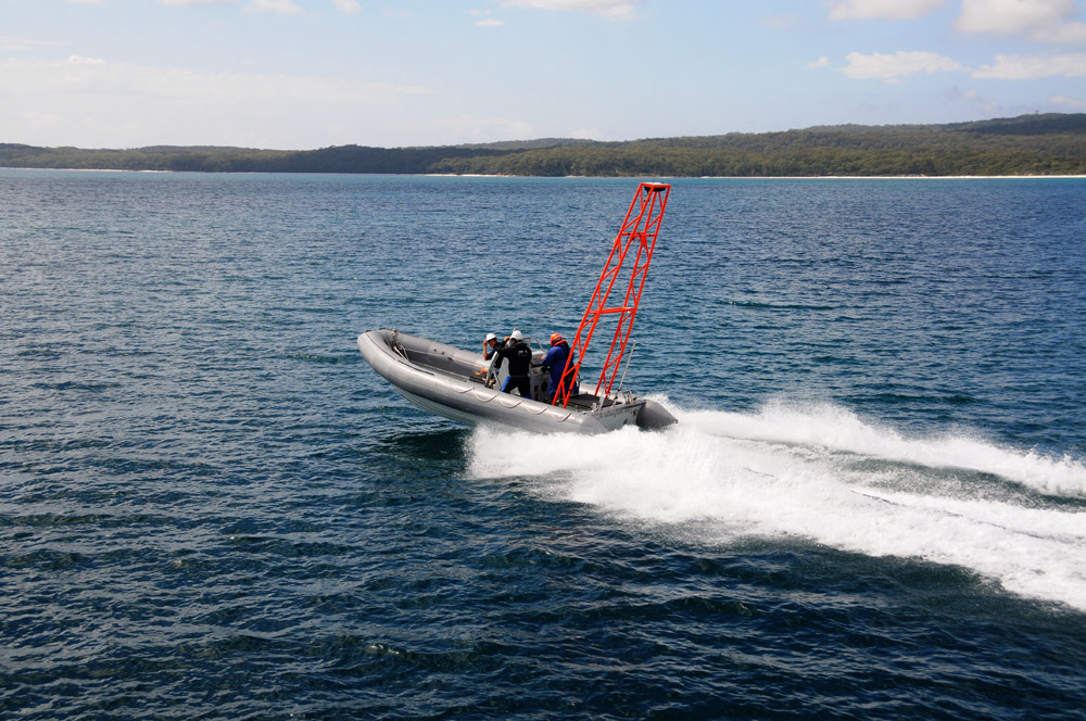 Test driving the Barracuda, a remotely-driven vessel used in navy training. Photo credit M. Jenner