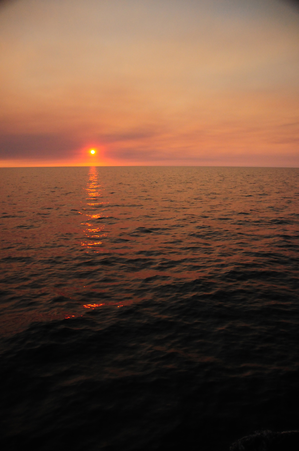 Another smoky sunset reminds us of the proximity of fires to north and south of Broome.