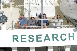 The research crew hard at work on the fly bridge looking for Pygmy Blue whales.  From left Max, Alicia, Brodee and Inday.  Photo credit M. Jenner