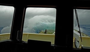 Big, blue waves wash ‘Whale Songs’ foredeck! Photo credit M. Jenner