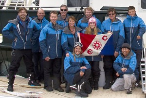 The WAVES team holding The Explorers Club Flag Number 69. From top left: Simon Kenion, David Davenport, Russ Andrews, Dale Peterson, Micheline Jenner, Curt Jenner, Tasmin Jenner, Rob McCauley, Sam Wright. From bottom left: Inday Ford, Resty Adenir. Photo credit to Wayne the Taxi Driver.