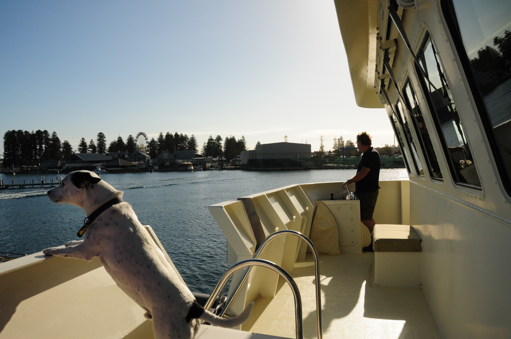 Leaving Fremantle Fishing Boat Harbour, Curt is at the helm with Skipper supervising!